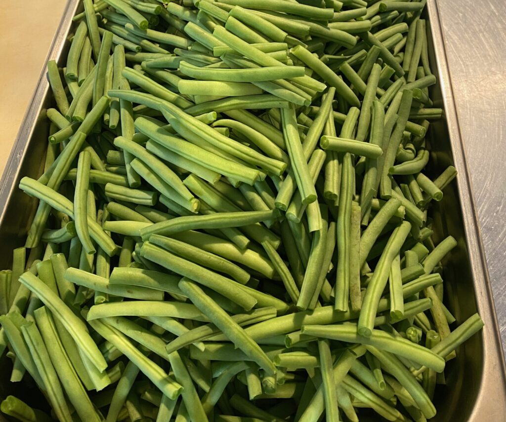 Sperziebonen in tomatensaus (v)